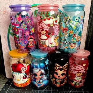 Pack of 7 acrylic glasses, 16 ounces each, with different designs and colors.
